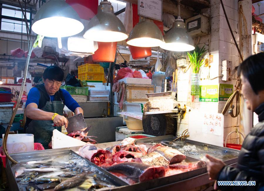 CHINA-MACAO-FISHMONGER-TRADITIONAL DRUNKEN DRAGON DANCE (CN)