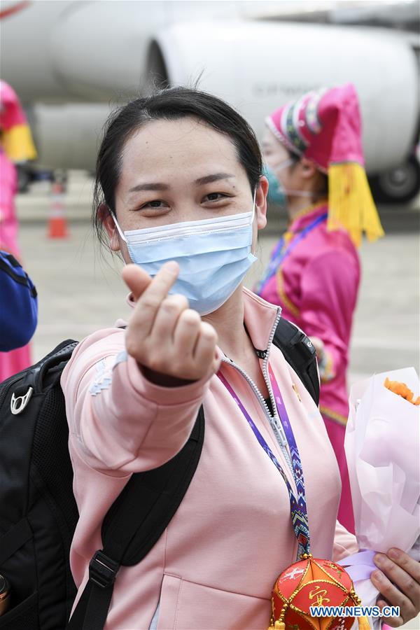 (PORTRAITS)CHINA-GUANGXI-COVID-19-MEDICS-RETURN HOME-ARRIVAL (CN)