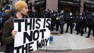 Protesters clash with riot police in Washington