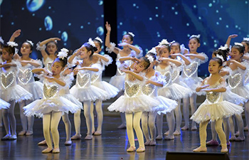 Children perform to greet upcoming Chinese lunar New Year in China's Hebei